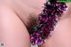 A close up of a woman's butt covered in tinsel.